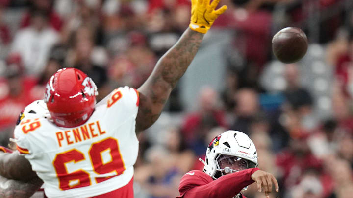 Arizona Cardinals quarterback Kyler Murray throws the ball as Kansas City Chiefs nose tackle Mike Pennel (69) defends during their preseason game at State Farm Stadium on Aug. 9, 2025. Arizona Cardinals quarterback Kyler Murray throws the ball as Kansas City Chiefs nose tackle Mike Pennel (69) defends during their preseason game at State Farm Stadium on Aug. 9, 2025.