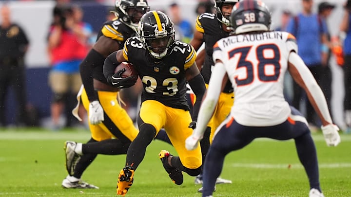 Sep 15, 2024; Denver, Colorado, USA; Pittsburgh Steelers safety Damontae Kazee (23) returns a intercepted football in the fourth quarter against the Denver Broncos at Empower Field at Mile High. Mandatory Credit: Ron Chenoy-Imagn Images
