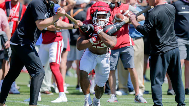 Ex-Husky Emeka Megwa (23) runs through a drill during an Oklahoma spring football practice in 2024.