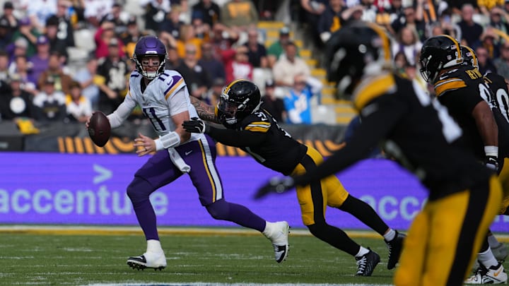 Sep 28, 2025; Dublin, Ireland; Minnesota Vikings quarterback Carson Wentz (11) is sacked by Pittsburgh Steelers linebacker Nick Herbig (51) during the first quarter during an NFL International Series game at Croke Park. Sep 28, 2025; Dublin, Ireland; Minnesota Vikings quarterback Carson Wentz (11) is sacked by Pittsburgh Steelers linebacker Nick Herbig (51) during the first quarter during an NFL International Series game at Croke Park.