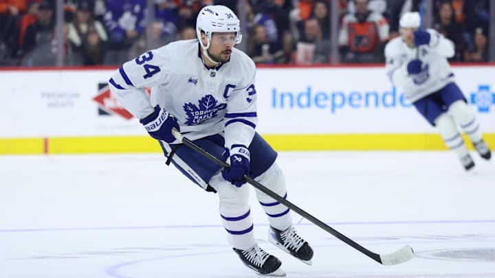Jan 8, 2026; Philadelphia, Pennsylvania, USA; Toronto Maple Leafs center Auston Matthews (34) skates with the puck against the Philadelphia Flyers during overtime at Xfinity Mobile Arena. Mandatory Credit: Bill Streicher-Imagn Images
