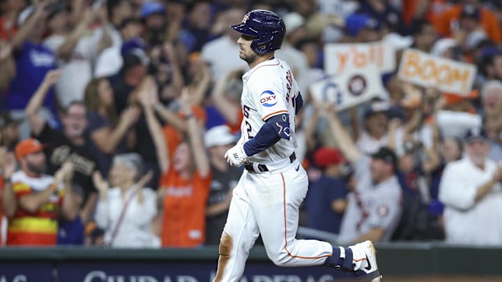 Jul 27, 2024; Houston, Texas, USA; Houston Astros third baseman Alex Bregman (2) rounds the bases after hitting a home run during the ninth inning against the Los Angeles Dodgers at Minute Maid Park. Mandatory Credit: Troy Taormina-Imagn Images