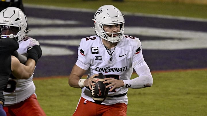 Nov 29, 2025; Fort Worth, Texas, USA; Cincinnati Bearcats quarterback Brendan Sorsby (2) runs with the ball during the game between the Horned Frogs and the Bearcats at Amon G. Carter Stadium. Mandatory Credit: Jerome Miron-Imagn Images Nov 29, 2025; Fort Worth, Texas, USA; Cincinnati Bearcats quarterback Brendan Sorsby (2) runs with the ball during the game between the Horned Frogs and the Bearcats at Amon G. Carter Stadium. Mandatory Credit: Jerome Miron-Imagn Images