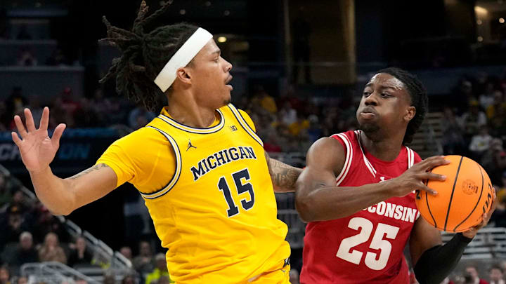 Michigan Wolverines guard Rubin Jones (15) guards Wisconsin Badgers guard John Blackwell (25) during the first half of the 2025 TIAA Big Ten Men’s Basketball Tournament final game on Sunday, March 16, 2025, at Gainbridge Fieldhouse in Indianapolis. Michigan defeated Wisconsin 59-53. Michigan Wolverines guard Rubin Jones (15) guards Wisconsin Badgers guard John Blackwell (25) during the first half of the 2025 TIAA Big Ten Men’s Basketball Tournament final game on Sunday, March 16, 2025, at Gainbridge Fieldhouse in Indianapolis. Michigan defeated Wisconsin 59-53.