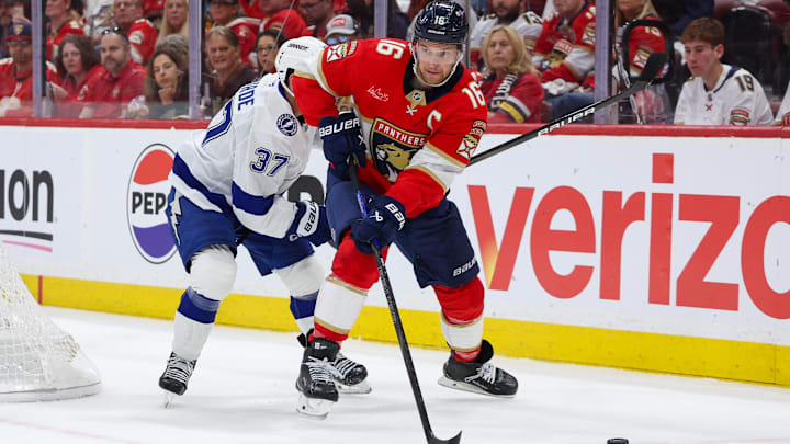 Apr 26, 2025; Sunrise, Florida, USA; Florida Panthers center Aleksander Barkov (16) controls the puck against the Tampa Bay Lightning in the first period during game three of the first round of the 2025 Stanley Cup Playoffs at Amerant Bank Arena. Mandatory Credit: Nathan Ray Seebeck-Imagn Images