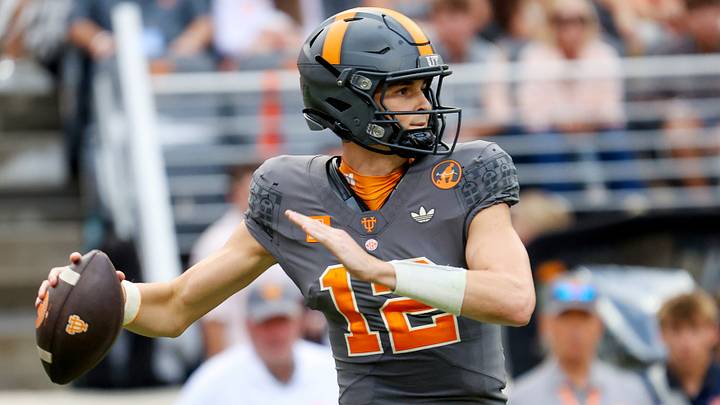 Oct 3, 2026; Knoxville, Tennessee, USA;  Tennessee Volunteers quarterback George MacIntyre (12) passes the ball against the Auburn Tigers during the second half against the Auburn Tigers at Neyland Stadium.  Mandatory Credit: Randy Sartin-Imagn Images