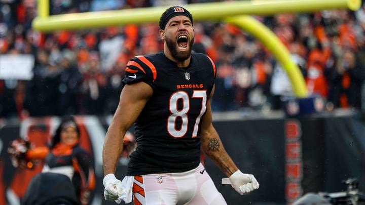 Jan 15, 2022; Cincinnati, Ohio, USA; Cincinnati Bengals tight end C.J. Uzomah (87) runs onto the field before to the game against the Las Vegas Raiders in an AFC Wild Card playoff football game at Paul Brown Stadium. Mandatory Credit: Katie Stratman-USA TODAY Sports Jan 15, 2022; Cincinnati, Ohio, USA; Cincinnati Bengals tight end C.J. Uzomah (87) runs onto the field before to the game against the Las Vegas Raiders in an AFC Wild Card playoff football game at Paul Brown Stadium. Mandatory Credit: Katie Stratman-USA TODAY Sports