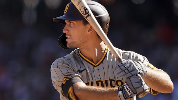 Oct 2, 2021; San Francisco, California, USA; San Diego Padres pinch hitter Adam Frazier (12) bats during the sixth inning against the San Francisco Giants at Oracle Park. Mandatory Credit: Darren Yamashita-Imagn Images Oct 2, 2021; San Francisco, California, USA; San Diego Padres pinch hitter Adam Frazier (12) bats during the sixth inning against the San Francisco Giants at Oracle Park. Mandatory Credit: Darren Yamashita-Imagn Images