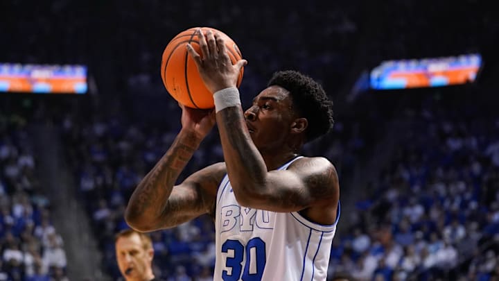 Mar 7, 2026; Provo, Utah, USA; BYU Cougars forward Kennard Davis Jr. (30) takes a jump shot during the first half against the Texas Tech Red Raiders at Marriott Center. Mandatory Credit: Aaron Baker-Imagn Images