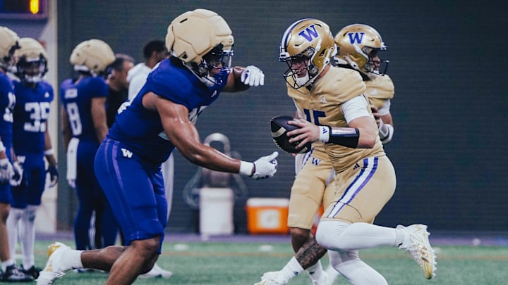 Julian McMahan fakes a handoff with quarterback Kai Horton.