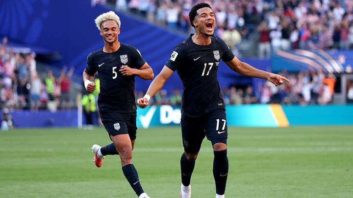 Malik Tillman and Antonee Robinson celebrate a USMNT goal during the 2026 World Cup.