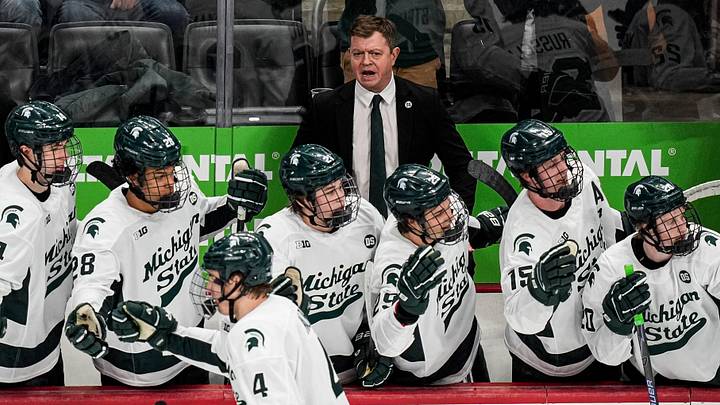 Michigan State head coach Adam Nightingale talks to players after a play against Michigan during the second period of Duel in the D at Little Caesars Arena in Detroit on Saturday, February 7, 2026.