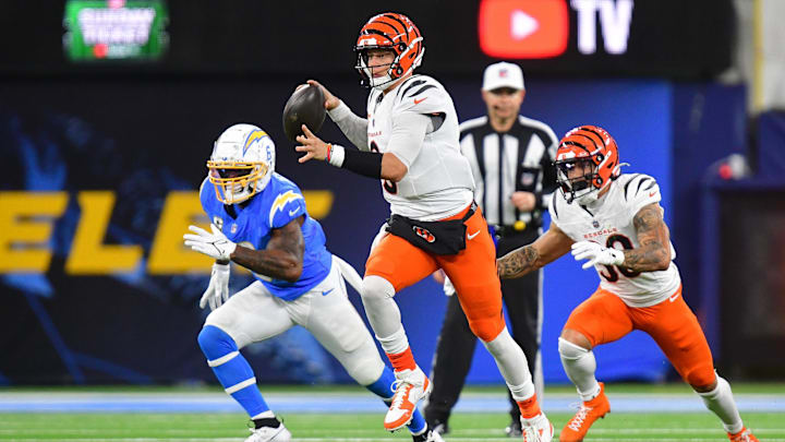 Cincinnati Bengals quarterback Joe Burrow rolls out to pass against the Los Angeles Chargers.