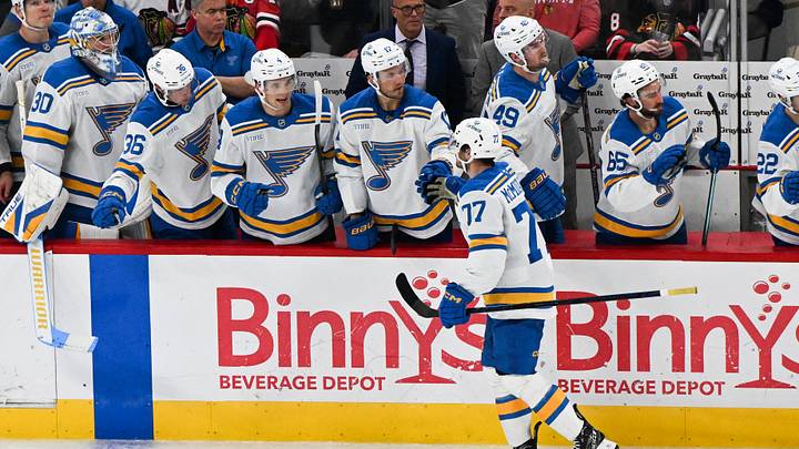 Oct 6, 2026; Chicago, Illinois, USA;  St. Louis Blues left wing Connor McMichael (77) celebrates with teammates after scoring a goal during the third period against the Chicago Blackhawks  at United Center.  Mandatory Credit: Matt Marton-Imagn Images