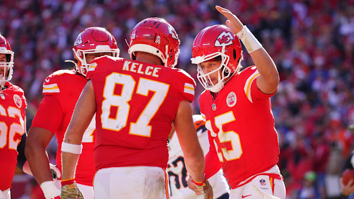 Nov 10, 2024; Kansas City, Missouri, USA; Kansas City Chiefs tight end Travis Kelce (87) celebrates with quarterback Patrick Mahomes (15) after scoring against the Denver Broncos during the first half at GEHA Field at Arrowhead Stadium. Mandatory Credit: Denny Medley-Imagn Images