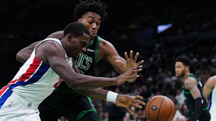 Nov 26, 2025; Boston, Massachusetts, USA; Detroit Pistons center Jalen Duren (0) and Boston Celtics forward Amari Williams (77) work for the ball in the first half at TD Garden. Mandatory Credit: David Butler II-Imagn Images Nov 26, 2025; Boston, Massachusetts, USA; Detroit Pistons center Jalen Duren (0) and Boston Celtics forward Amari Williams (77) work for the ball in the first half at TD Garden. Mandatory Credit: David Butler II-Imagn Images