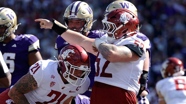 Washington State Cougars defensive tackle Kaden Beatty (52) reacts to a defensive stop against the Washington Huskies during the second quarter at Husky Stadium. Washington State Cougars defensive tackle Kaden Beatty (52) reacts to a defensive stop against the Washington Huskies during the second quarter at Husky Stadium.