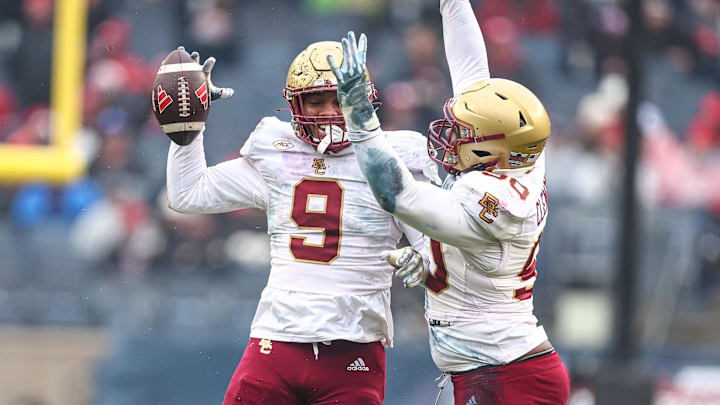 Dec 28, 2024; Bronx, NY, USA; Boston College Eagles defensive lineman Josiah Griffin (9) celebrates after a fumble recovery during the first half against the Nebraska Cornhuskers at Yankee Stadium. Mandatory Credit: Vincent Carchietta-Imagn Images