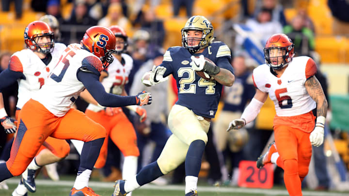 Nov 26, 2016; Pittsburgh, PA, USA;  Pittsburgh Panthers running back James Conner (24) rushes the ball against the Syracuse Orange during the fourth quarter at Heinz Field. PITT won 76-61. Mandatory Credit: Charles LeClaire-Imagn Images