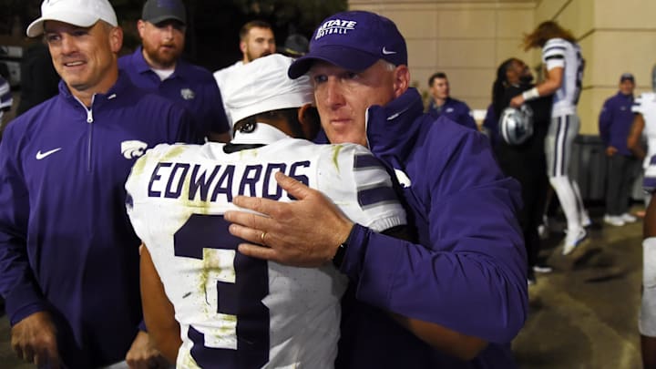 Oct 12, 2024; Boulder, Colorado, USA; Kansas State Wildcats running back Dylan Edwards (3) celebrates with Kansas State Wildcats head coach Chris Klieman after a win against the Colorado Buffaloes at Folsom Field. Mandatory Credit: Christopher Hanewinckel-Imagn Images