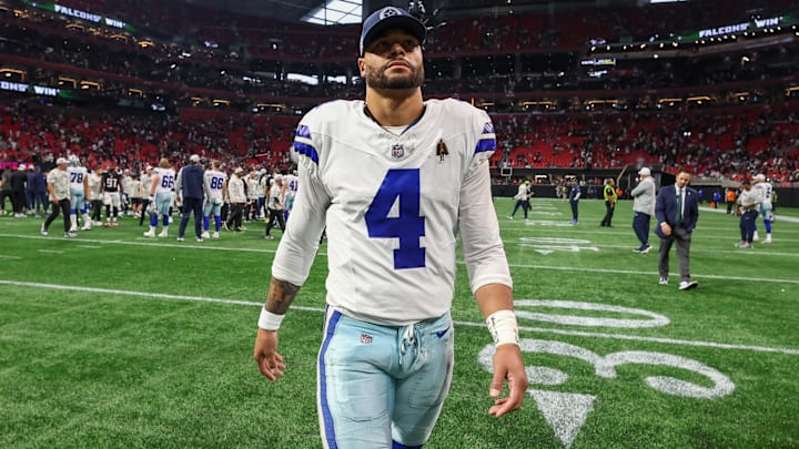 Dallas Cowboys quarterback Dak Prescott (4) walks off the field after a game against the Atlanta Falcons at Mercedes-Benz Stadium.