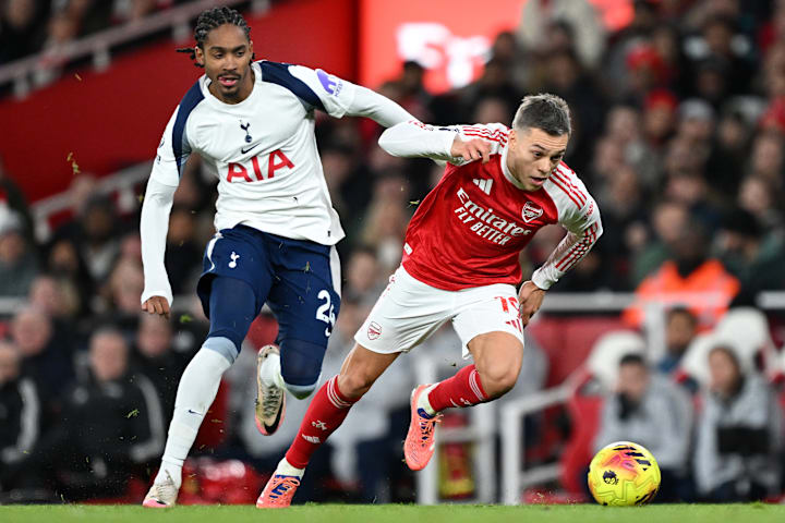 Djed Spence (left) battling Leandro Trossard.