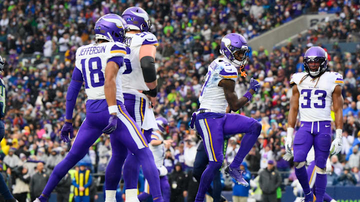 Dec 22, 2024; Seattle, Washington, USA; Minnesota Vikings wide receiver Jordan Addison (3) celebrates with teammates after scoring a touchdown against the Seattle Seahawks at Lumen Field. Dec 22, 2024; Seattle, Washington, USA; Minnesota Vikings wide receiver Jordan Addison (3) celebrates with teammates after scoring a touchdown against the Seattle Seahawks at Lumen Field.