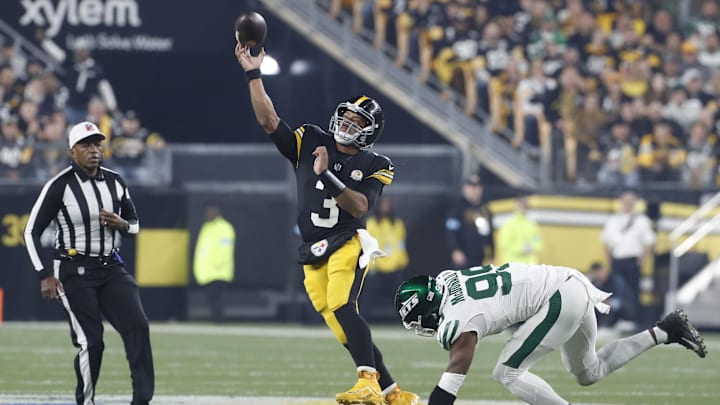 Wilson threw for 264 yards and two touchdowns and ran for another in his Steelers debut. 