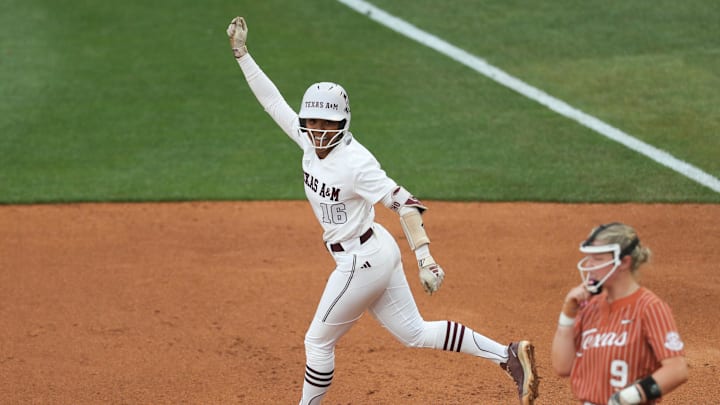 May 9, 2025; Athens, GA, USA; Texas A&M infielder KK Dement (16) reacts to her home run during a game against Texas at Jack Turner Stadium. Mandatory Credit: Mady Mertens-Imagn Images May 9, 2025; Athens, GA, USA; Texas A&M infielder KK Dement (16) reacts to her home run during a game against Texas at Jack Turner Stadium. Mandatory Credit: Mady Mertens-Imagn Images