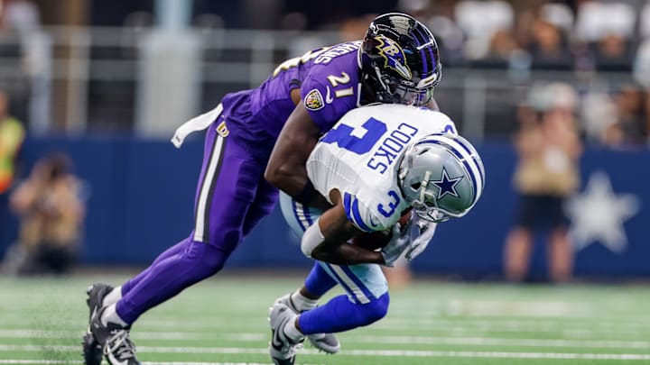 Sep 22, 2024; Arlington, Texas, USA; Dallas Cowboys wide receiver Brandin Cooks (3) is tackled after a reception by Baltimore Ravens cornerback Brandon Stephens (21) during the first quarter at AT&T Stadium. Mandatory Credit: Andrew Dieb-Imagn Images Sep 22, 2024; Arlington, Texas, USA; Dallas Cowboys wide receiver Brandin Cooks (3) is tackled after a reception by Baltimore Ravens cornerback Brandon Stephens (21) during the first quarter at AT&T Stadium. Mandatory Credit: Andrew Dieb-Imagn Images