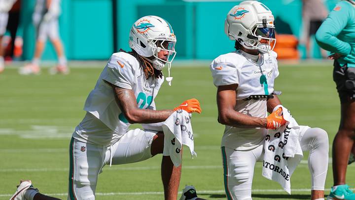 Miami Dolphins wide receiver Theo Wease Jr. (81) and wide receiver Jalen Tolbert (1) look on during practice at Hard Rock Stadium. Miami Dolphins wide receiver Theo Wease Jr. (81) and wide receiver Jalen Tolbert (1) look on during practice at Hard Rock Stadium.