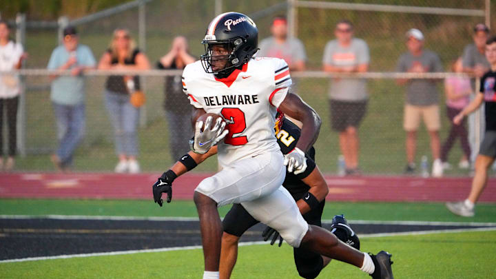 Sep 13, 2024; Sunbury, Ohio, USA; Delaware Hayes Favour Akih (2) runs the ball in for a touchdown against Big Walnut in the first half at Big Walnut High School. Sep 13, 2024; Sunbury, Ohio, USA; Delaware Hayes Favour Akih (2) runs the ball in for a touchdown against Big Walnut in the first half at Big Walnut High School.