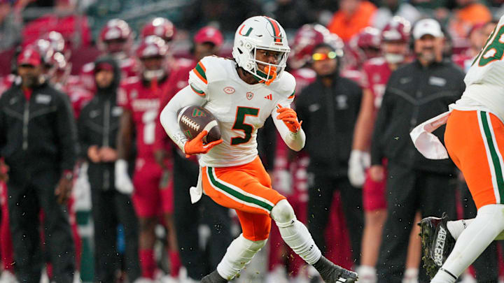 Sep 23, 2023; Philadelphia, Pennsylvania, USA; Miami Hurricanes wide receiver Ray Ray Joseph (5) picks up a first down in the fourth quarter against the Temple Owls at Lincoln Financial Field. Mandatory Credit: Andy Lewis-Imagn Images