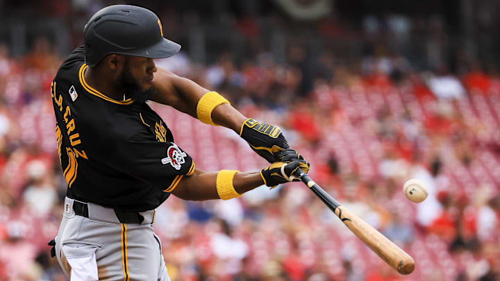 Pittsburgh Pirates outfielder Bryan De La Cruz (41) hits a single in the ninth inning against the Cincinnati Reds at Great American Ball Park. 