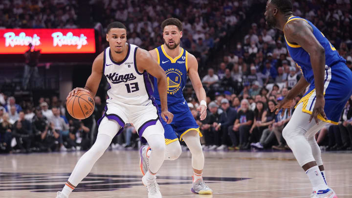 Apr 16, 2024; Sacramento, California, USA; Sacramento Kings forward Keegan Murray (13) dribbles the ball in front of Golden State Warriors guard Klay Thompson (11) in the first quarter during a play-in game of the 2024 NBA playoffs at the Golden 1 Center. Mandatory Credit: Cary Edmondson-USA TODAY Sports Apr 16, 2024; Sacramento, California, USA; Sacramento Kings forward Keegan Murray (13) dribbles the ball in front of Golden State Warriors guard Klay Thompson (11) in the first quarter during a play-in game of the 2024 NBA playoffs at the Golden 1 Center. Mandatory Credit: Cary Edmondson-USA TODAY Sports