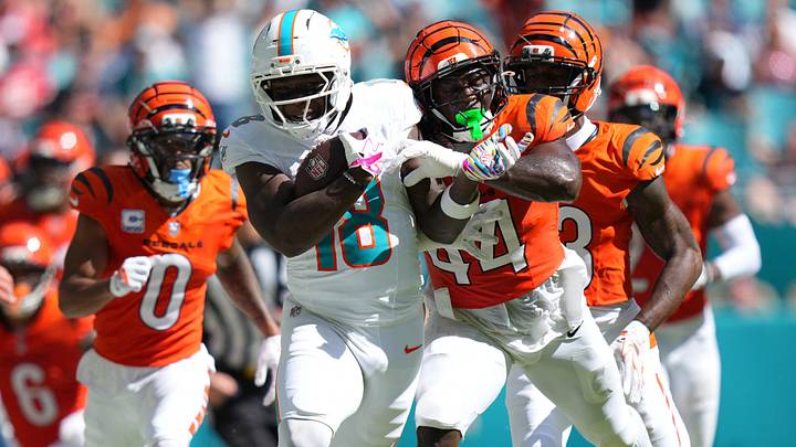 Cincinnati Bengals linebacker Demetrius Knight Jr. (44) tackles Miami Dolphins wide receiver Chris Bell (18) during the third quarter at Hard Rock Stadium in Week 5. Cincinnati Bengals linebacker Demetrius Knight Jr. (44) tackles Miami Dolphins wide receiver Chris Bell (18) during the third quarter at Hard Rock Stadium in Week 5.