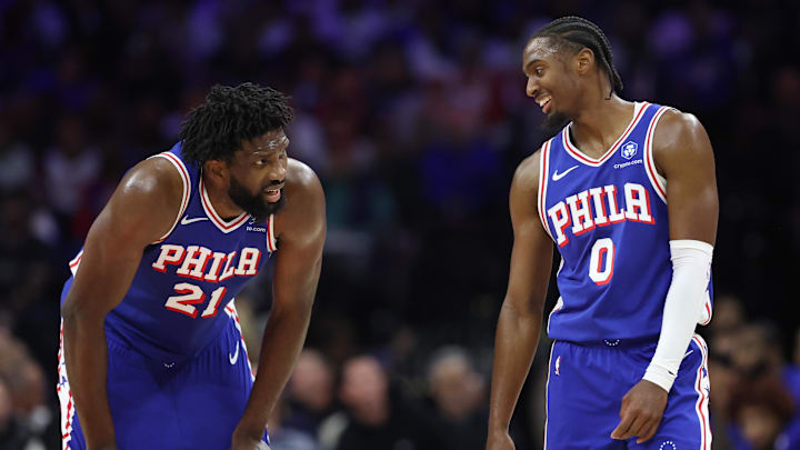 Oct 25, 2025; Philadelphia, Pennsylvania, USA; Philadelphia 76ers guard Tyrese Maxey (0) and center Joel Embiid (21) talks during a break in action in the second quarter against the Charlotte Hornets at Xfinity Mobile Arena. Mandatory Credit: Bill Streicher-Imagn Images Oct 25, 2025; Philadelphia, Pennsylvania, USA; Philadelphia 76ers guard Tyrese Maxey (0) and center Joel Embiid (21) talks during a break in action in the second quarter against the Charlotte Hornets at Xfinity Mobile Arena. Mandatory Credit: Bill Streicher-Imagn Images