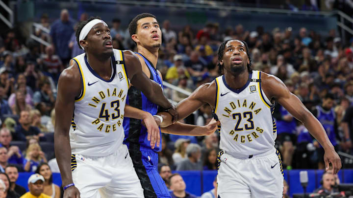 Mar 10, 2024; Orlando, Florida, USA; Indiana Pacers forward Pascal Siakam (43) forward Aaron Nesmith (23) and Orlando Magic guard Caleb Houstan (2) look for the rebound during the second quarter at KIA Center. Mandatory Credit: Mike Watters-USA TODAY Sports