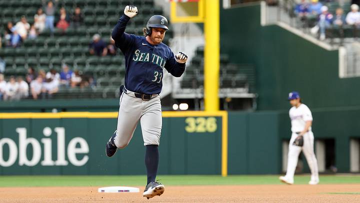 Apr 7, 2026; Arlington, Texas, USA; Seattle Mariners third baseman Brendan Donovan (33) reacts after hitting a home run during the first inning against the Texas Rangers at Globe Life Field. Mandatory Credit: Kevin Jairaj-Imagn Images