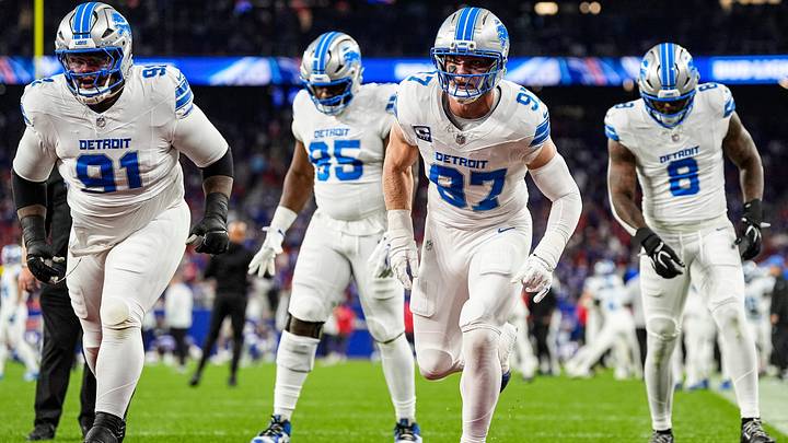 Detroit Lions edge rusher Aidan Hutchinson (97), center, and defensive lineman Tyleik Williams (91) warm up ahead of the game between Detroit Lions and Buffalo Bills at Highmark Stadium in Orchard Park, N.Y., on Thursday, Sept. 17, 2026. Detroit Lions edge rusher Aidan Hutchinson (97), center, and defensive lineman Tyleik Williams (91) warm up ahead of the game between Detroit Lions and Buffalo Bills at Highmark Stadium in Orchard Park, N.Y., on Thursday, Sept. 17, 2026.