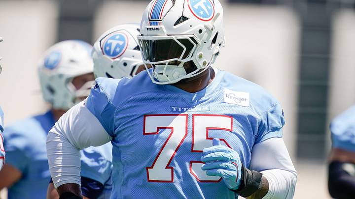 Tennessee Titans tackle Dan Moore Jr. (75) heads to the field during mandatory minicamp at Vanderbilt Health Football Center in Nashville, Tenn., Wednesday, June 17, 2026. Tennessee Titans tackle Dan Moore Jr. (75) heads to the field during mandatory minicamp at Vanderbilt Health Football Center in Nashville, Tenn., Wednesday, June 17, 2026.