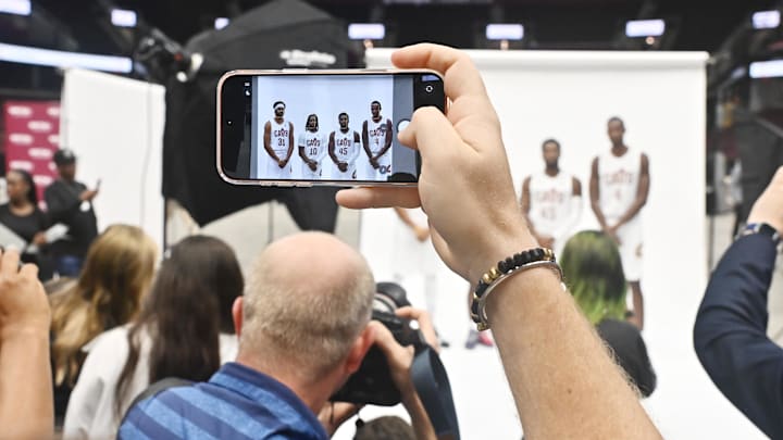 Sep 29, 2025; Cleveland, OH, USA;  Cleveland Cavaliers center Jarrett Allen (31) and guard Darius Garland (10) and guard Donovan Mitchell (45) and forward Evan Mobley (4) poses for a photo during media day at Rocket Arena. Mandatory Credit: Ken Blaze-Imagn Images