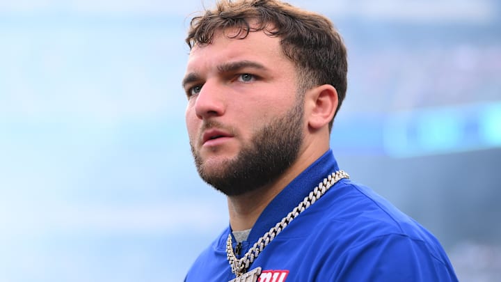 New York Giants running back Cam Skattebo (44) walks on the field prior to a game against the New York Jets at MetLife Stadium.