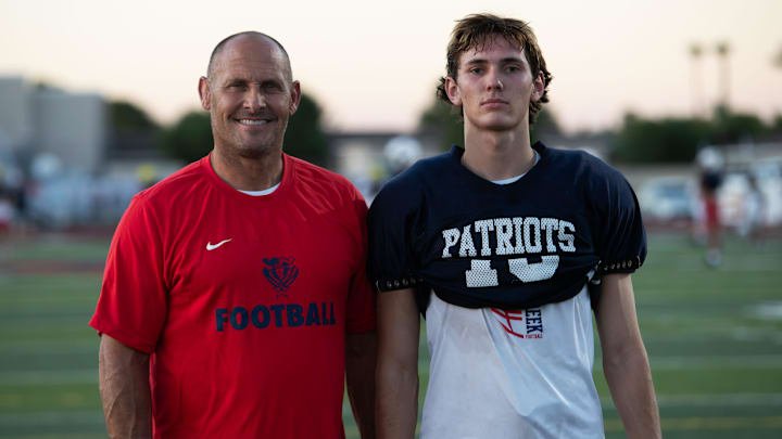 Queen Creek assistant coach Nathan LaDuke and defensive back Nate LaDuke (10) on Sept. 26, 2023, at American Leadership Queen Creek's football field.