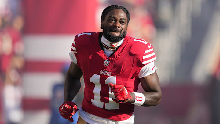 Sep 9, 2024; Santa Clara, California, USA; San Francisco 49ers wide receiver Brandon Aiyuk (11) is introduced to the crowd before the game against the New York Jets at Levi's Stadium. Mandatory Credit: Darren Yamashita-Imagn Images