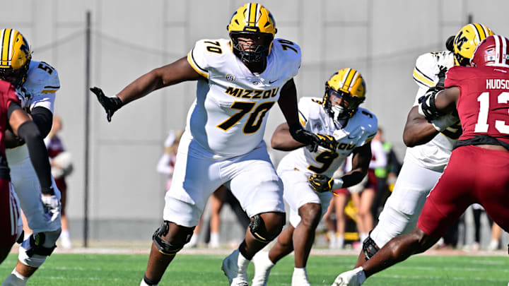 Oct 12, 2024; Amherst, Massachusetts, USA; Missouri Tigers offensive lineman Cayden Green (70) in action during the second half against the Massachusetts Minutemen at Warren McGuirk Alumni Stadium. Mandatory Credit: Eric Canha-Imagn Images