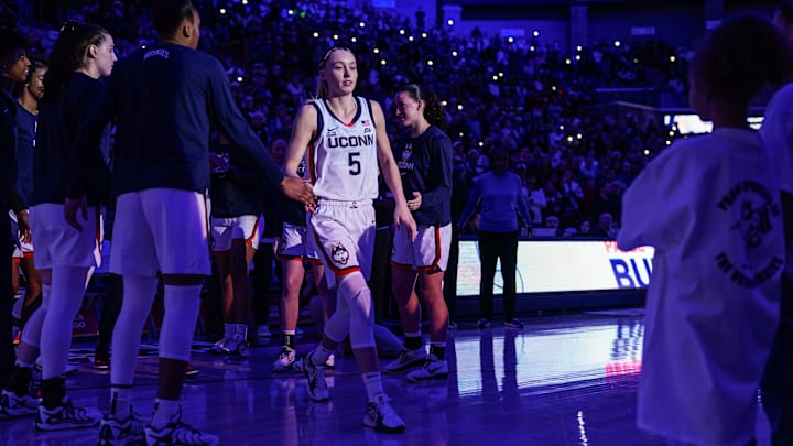 UConn Huskies guard Paige Bueckers is introduced before the start of the game against the Villanova Wildcats. UConn Huskies guard Paige Bueckers is introduced before the start of the game against the Villanova Wildcats.