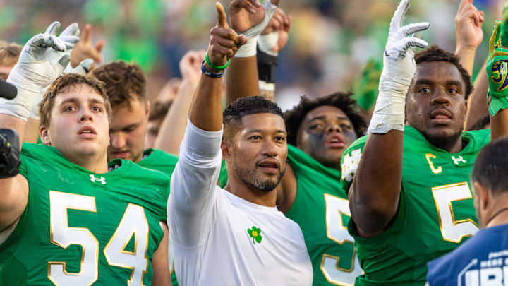 Oct 4, 2025; South Bend, Indiana, USA; Notre Dame Fighting Irish head coach Marcus Freeman sings the Alma Mater after beating the Boise State Broncos at Notre Dame Stadium. Mandatory Credit: Michael Caterina-Imagn Images