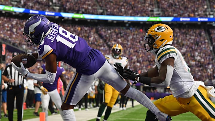 Minnesota Vikings wide receiver Justin Jefferson scores against the Green Bay Packers in 2022.
