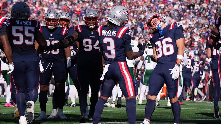 New England Patriots wide receiver Demario Douglas (3) celebrates a touchdown wide receiver Efton Chism III (86) in the second quarter against the New York Jets at Gillette Stadium.